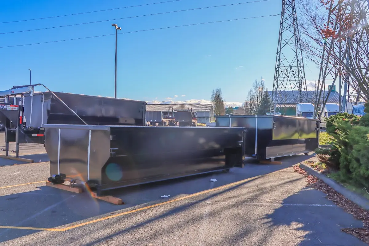 Roll-off dumpster ready for waste disposal at job site for 12 Yard Dumpster Rental in Jasper